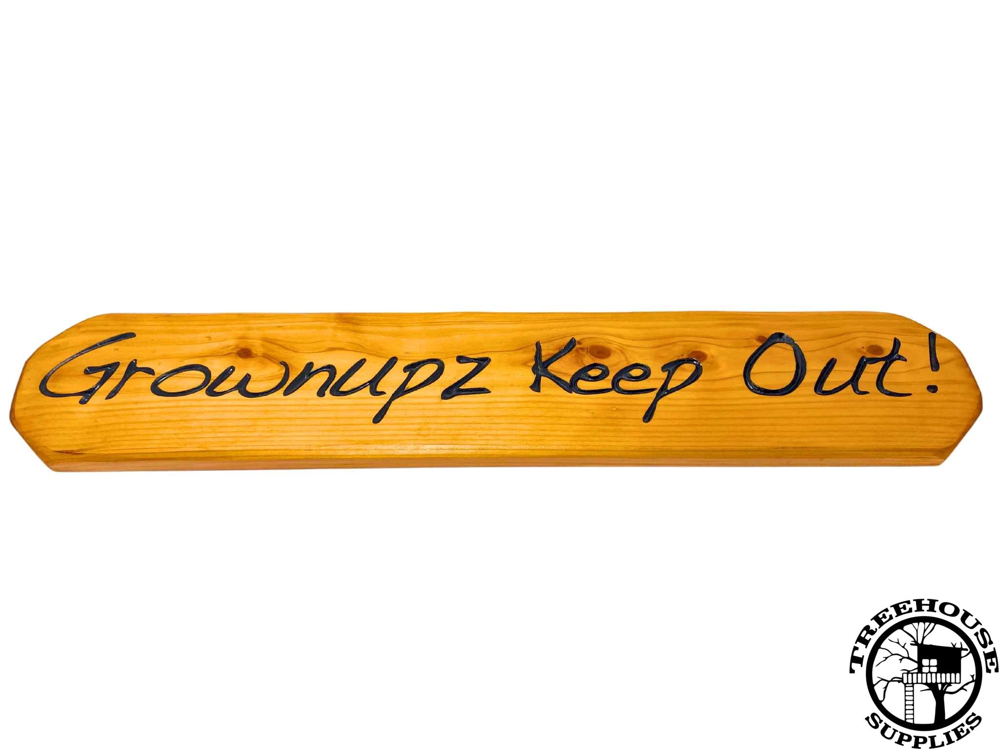 Two-foot-long wooden sign with lettering. Engraved or carved text states Grownupz Keep Out! White Background. Side view.